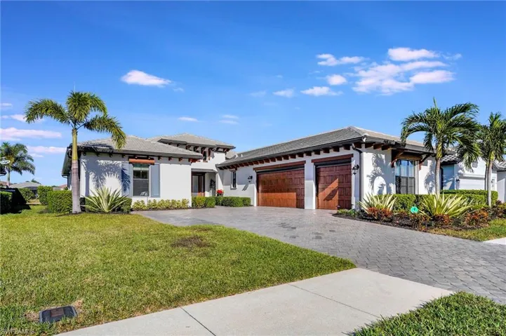 Tile roof, sealed paver driveway, 3+ car garage