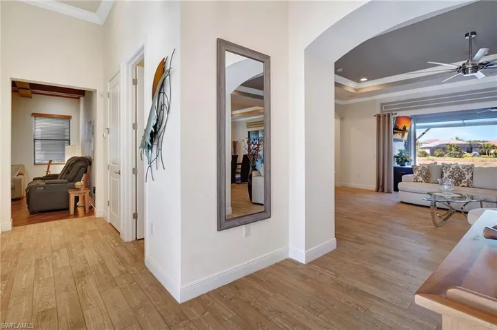 Foyer with unobstructed pool and water views