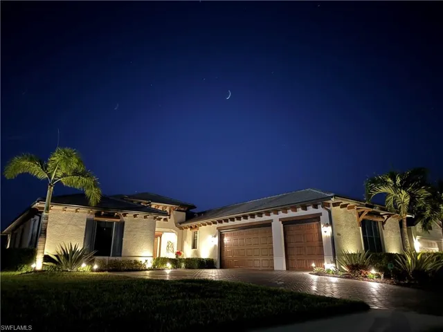 Illuminated at night with landscape lighting