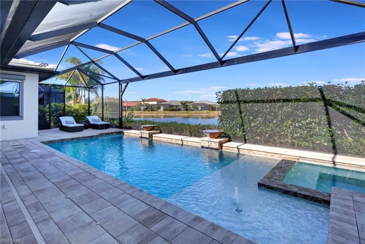 with hot tub and  picture frame screen overlooking the lake
