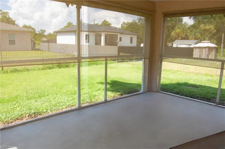Unfurnished sunroom with plenty of natural light