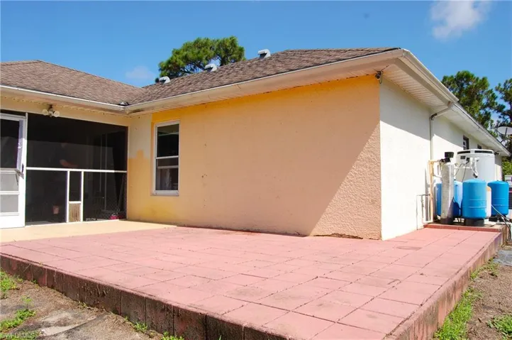 Rear view of property with a patio area