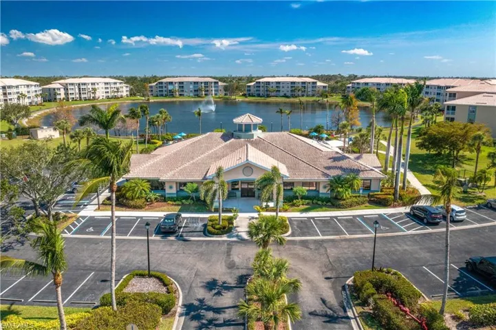 Bird's eye view of apartment complex and a large body of water