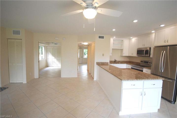 View of living room, looking into guest and master bedrooms