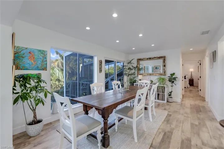 Dining area featuring recessed lighting and light wood-style floors