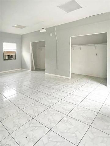 Master Bedroom Suite with window unit & central A/C.