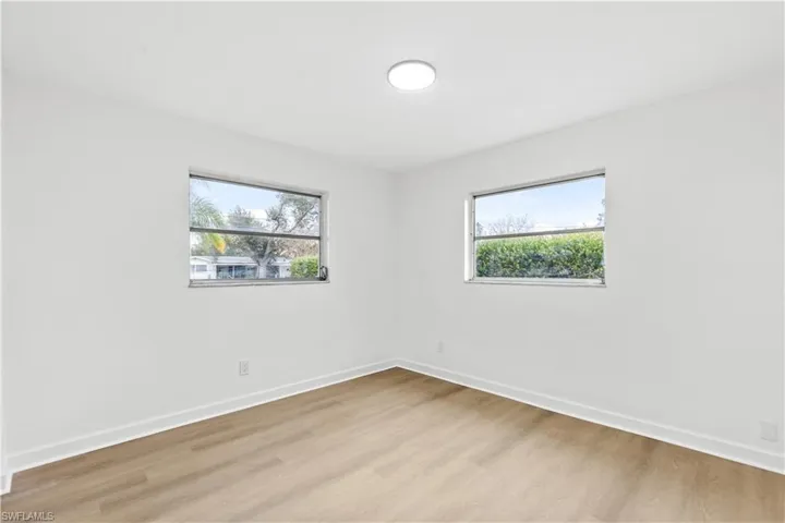 Spare room featuring light hardwood / wood-style flooring