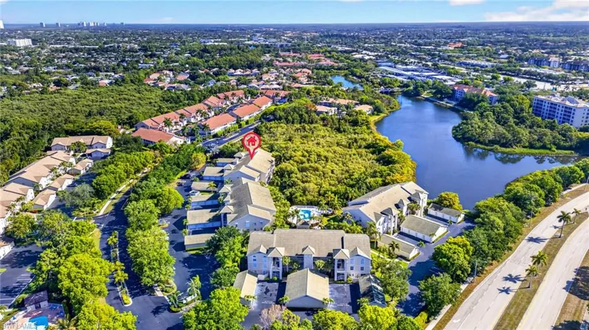 Aerial perspective showcasing a residential community with mature landscaping