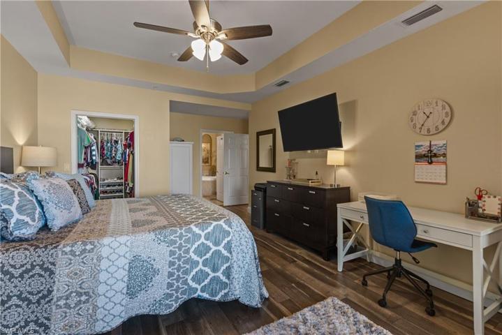Wood laminate flooring in all three bedrooms