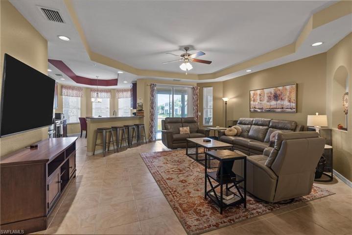 Inviting open floorplan, seamlessly blending the kitchen, dining, and living areas,