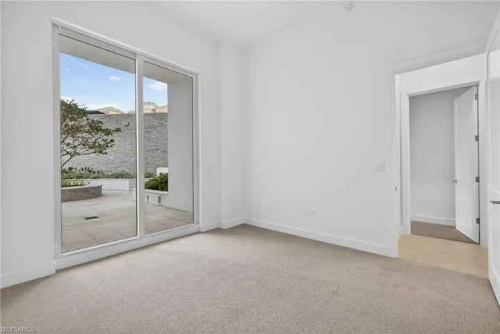 Bedroom 3 with sliders to outdoor private terrace