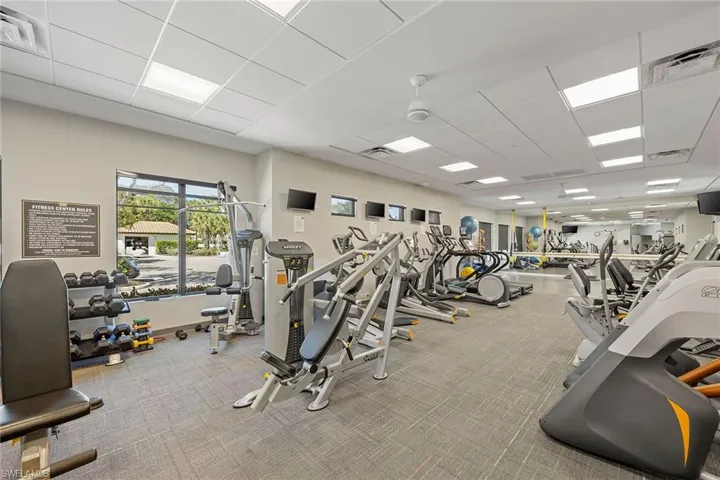 Workout area featuring a paneled ceiling