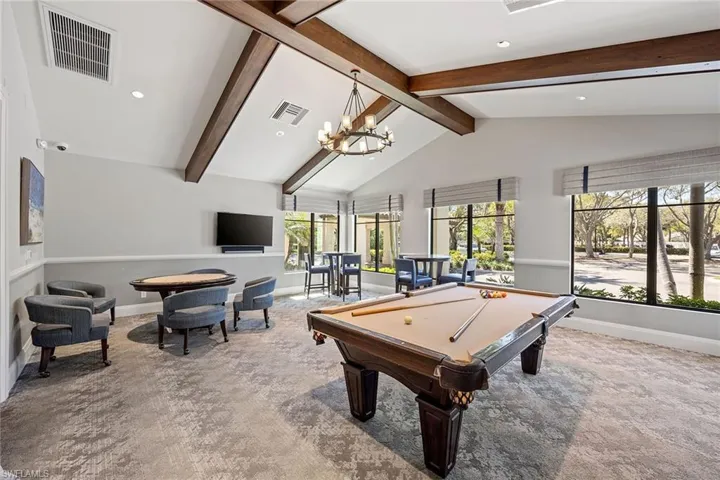 Rec room with recessed lighting and billiards