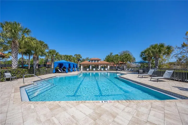 Community pool featuring a patio area and a gazebo