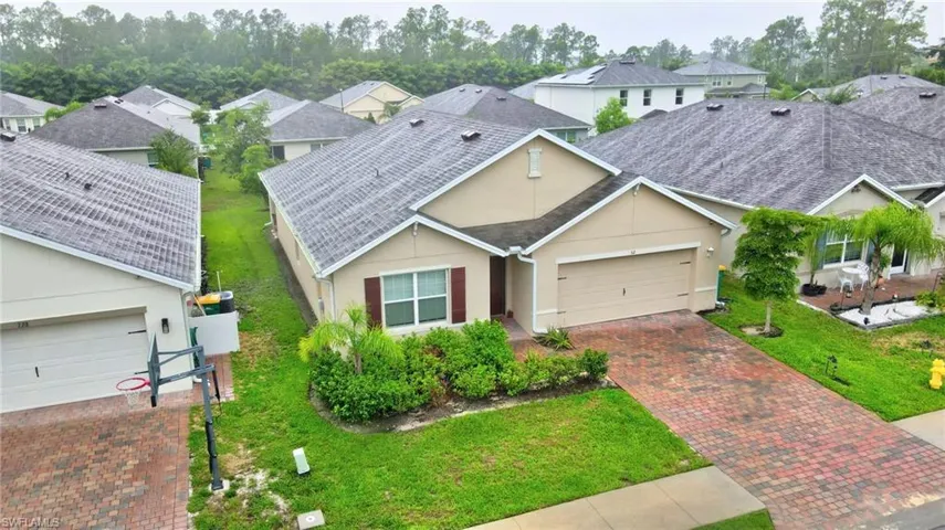 Ranch-style house featuring a garage