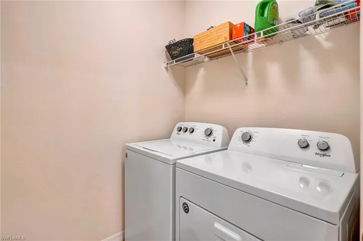 Laundry room with washing machine and dryer