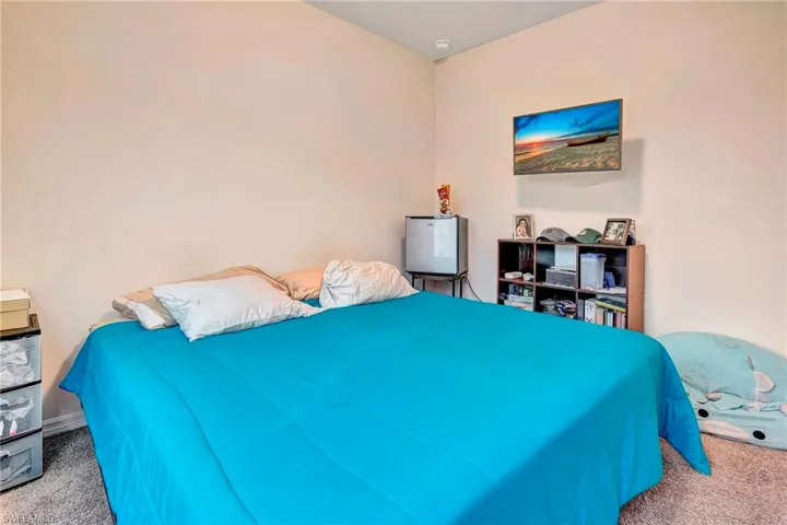 Bedroom featuring carpet