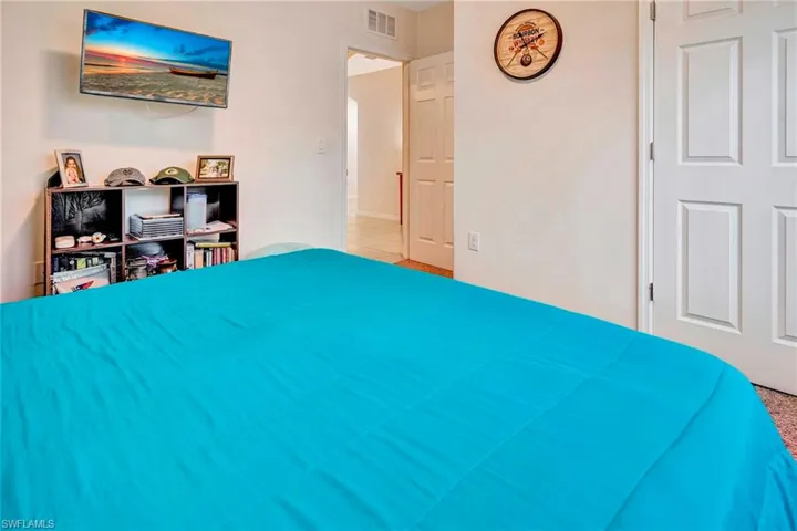 Bedroom featuring tile flooring