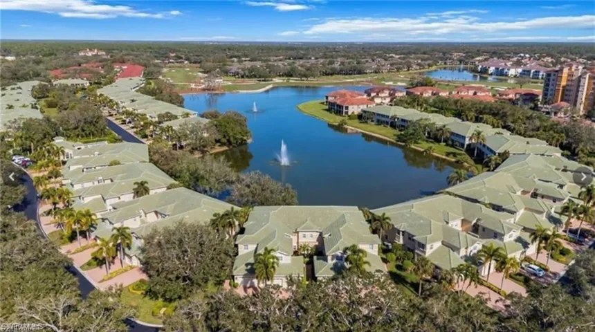 Aerial view of residential area with a large body of water