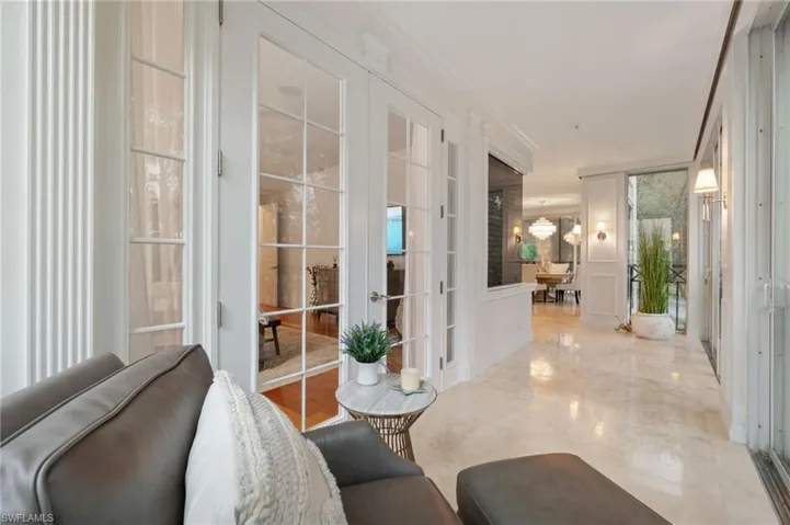 Quiet reading area or coffee spot off the master bedroom and it overlooks the golf course.