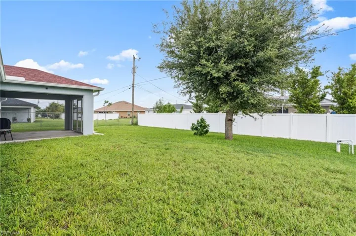 View of yard with a patio area