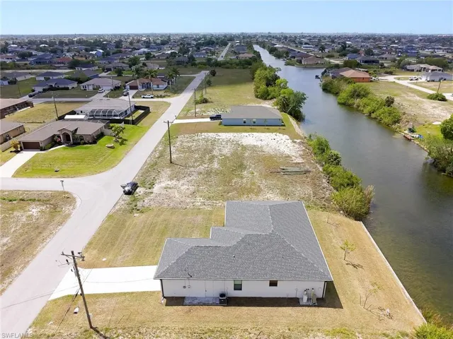 Four bedroom home built in 2024 on fresh waterfront canal with seawall