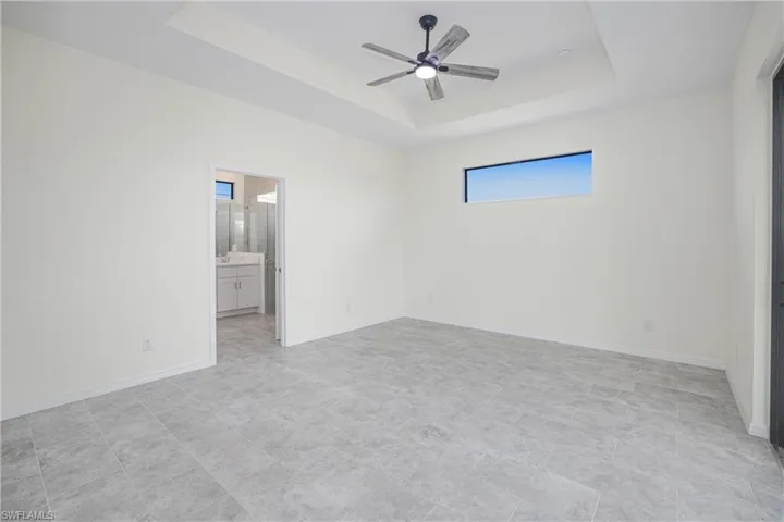 Primary bedroom with private bathroom.