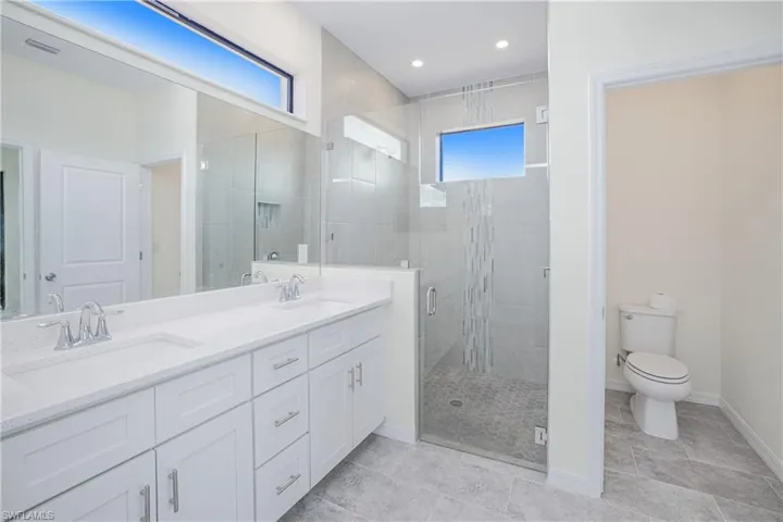 Dual sinks and walk in shower