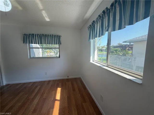 3rd Bedroom with a walk in closet and a view of canal