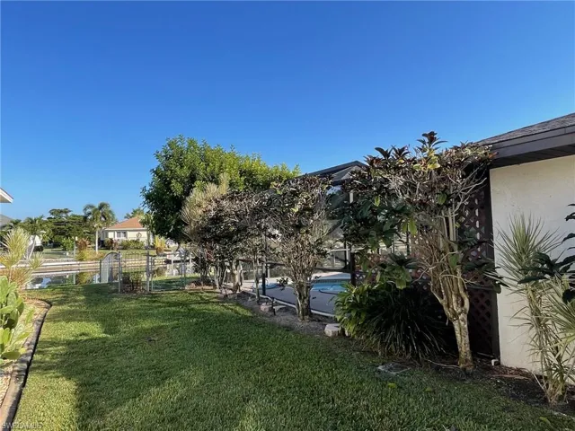 View West side of yard with an outdoor pool