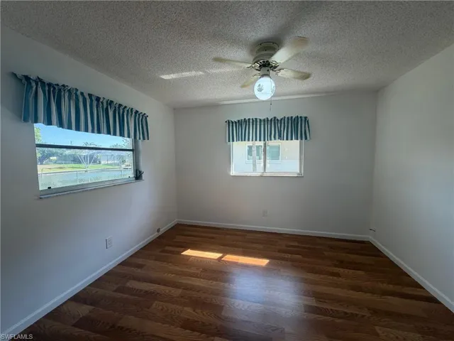 3rd Bedroom with a walk in closet and a view of canal