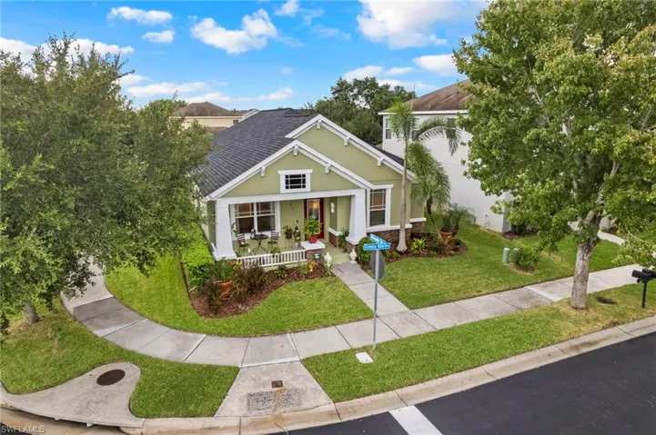View of front of property featuring a front yard and a porch