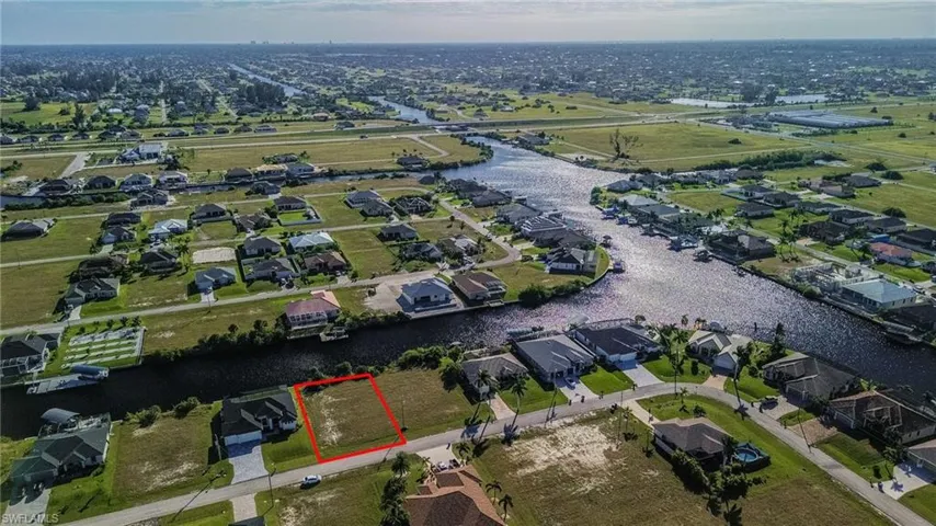 View of property location with property boundaries highlighted and nearby suburban area