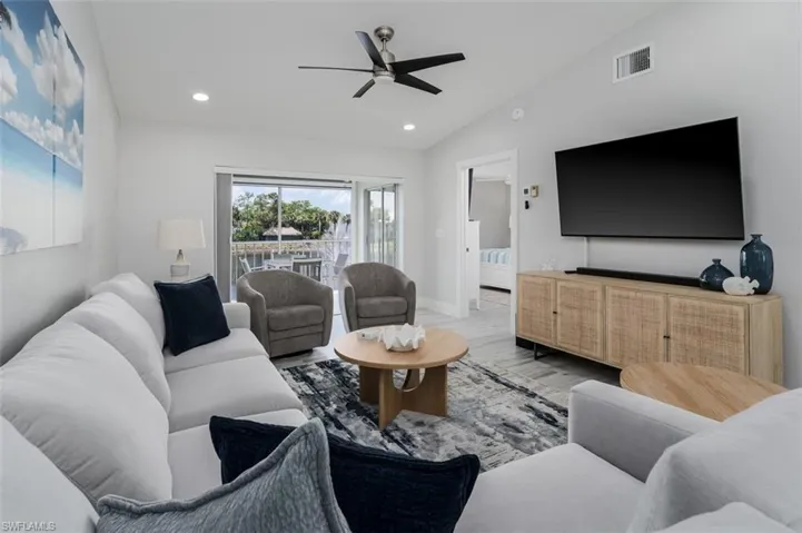 The gray bucket chairs SWIVEL around to view the lake.