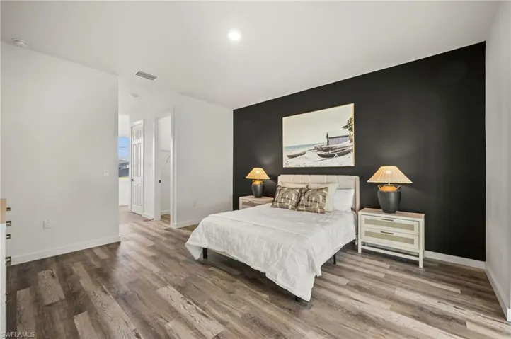 Bedroom featuring hardwood / wood-style floors