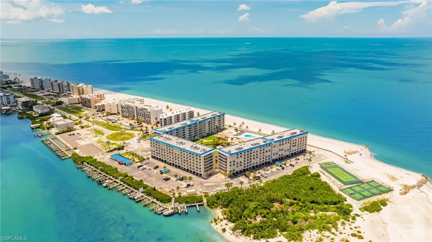 View of urban area with waterfront with a beach