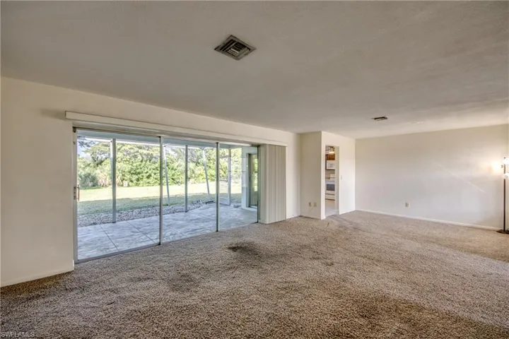 Sliders Lead to Expansive Backyard