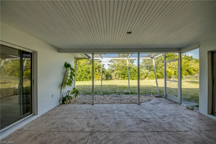 Lanai Entry from both Primary Bedroom & Kitchen Sliders