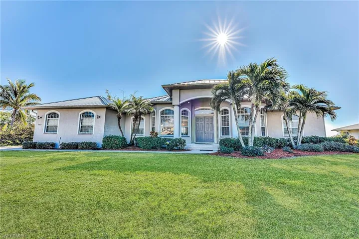 View of front of house with a front yard