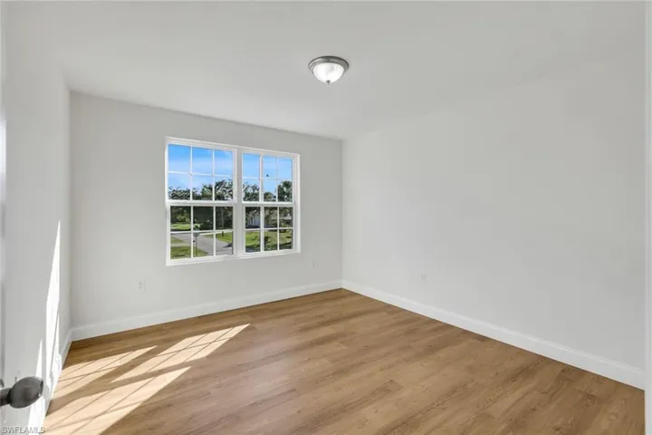 Unfurnished room featuring light hardwood / wood-style flooring