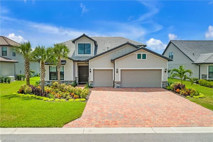 Front of house with professionally designed landscape