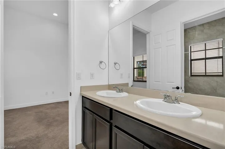 Bathroom featuring dual vanity