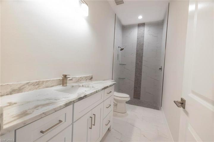 Guest Bath divides bedroom 2 and 3.