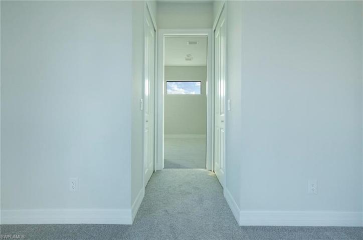 Master bedroom Hallway With walk-in closets