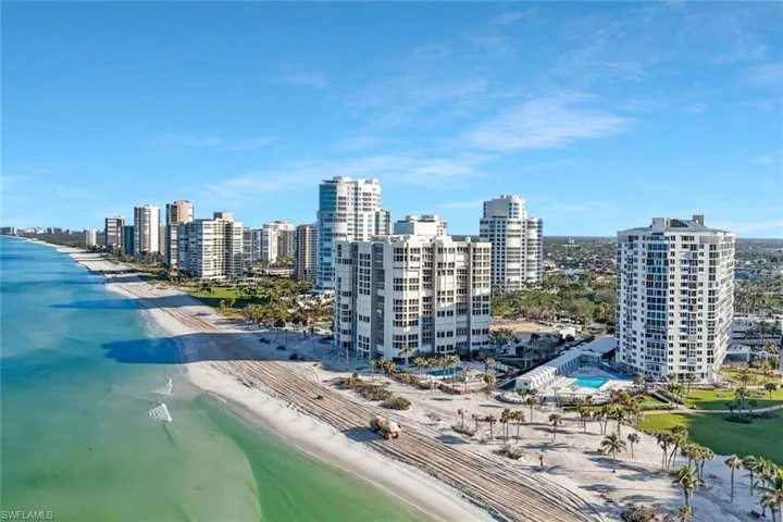 View of property with a Gulf and beach view.