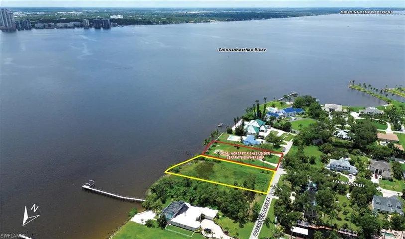 View of property location featuring a large body of water and property parcel outlined