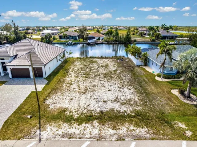 Aerial view of residential area with a large body of water