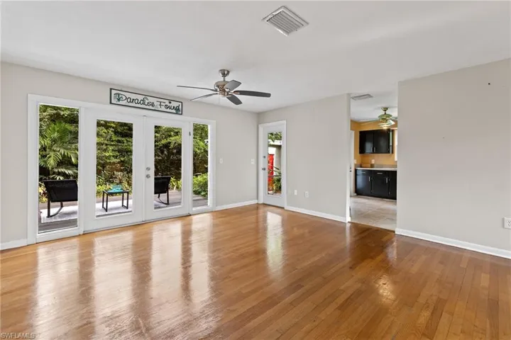 French doors lead to deck & glorious garden