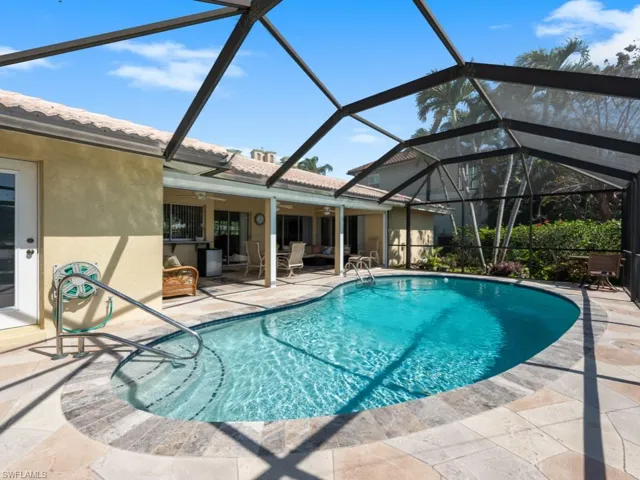 Pool featuring a patio area, a lanai, and a ceiling fan