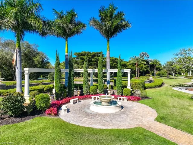 Surrounding community with a yard and a patio area